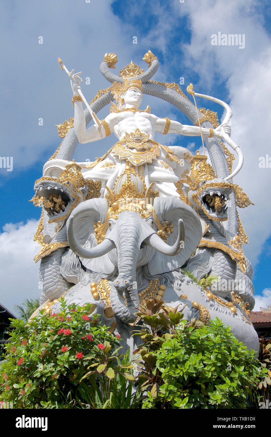 Ubud, Bali, Indonesia - 5th May 2019 : Low angle view on the majestic Arjuna Statue located at the roundabout in Ubud, Bali - Indonesia Stock Photo