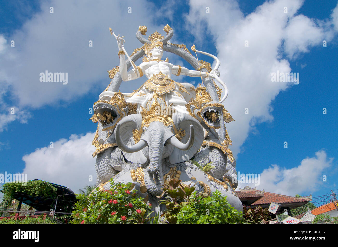 Ubud, Bali, Indonesia - 5th May 2019 : Low angle view on the majestic Arjuna Statue located at the roundabout in Ubud, Bali - Indonesia Stock Photo
