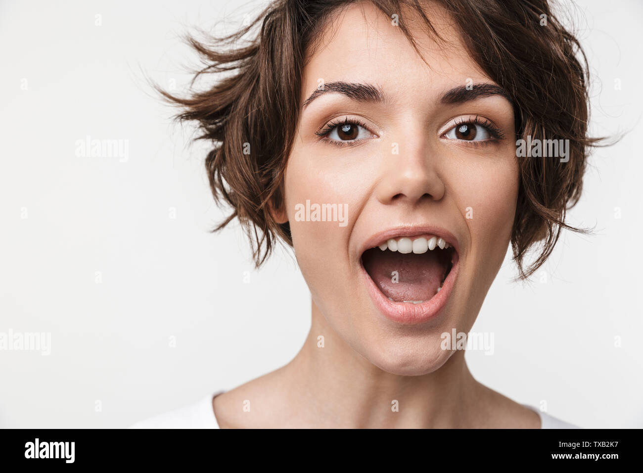 Portrait Closeup Of Cute Woman With Short Brown Hair In Basic T