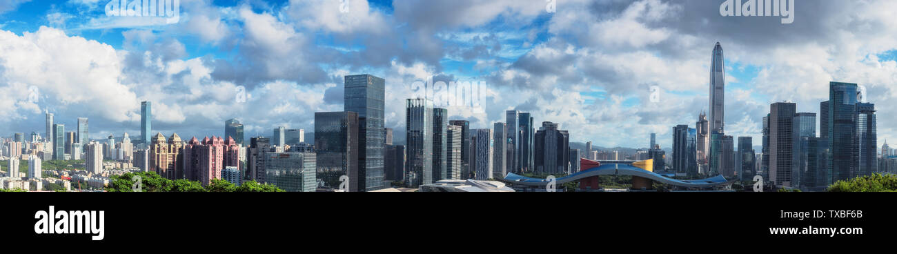 Reflection panorama of buildings under cbd blue sky and white clouds in ...
