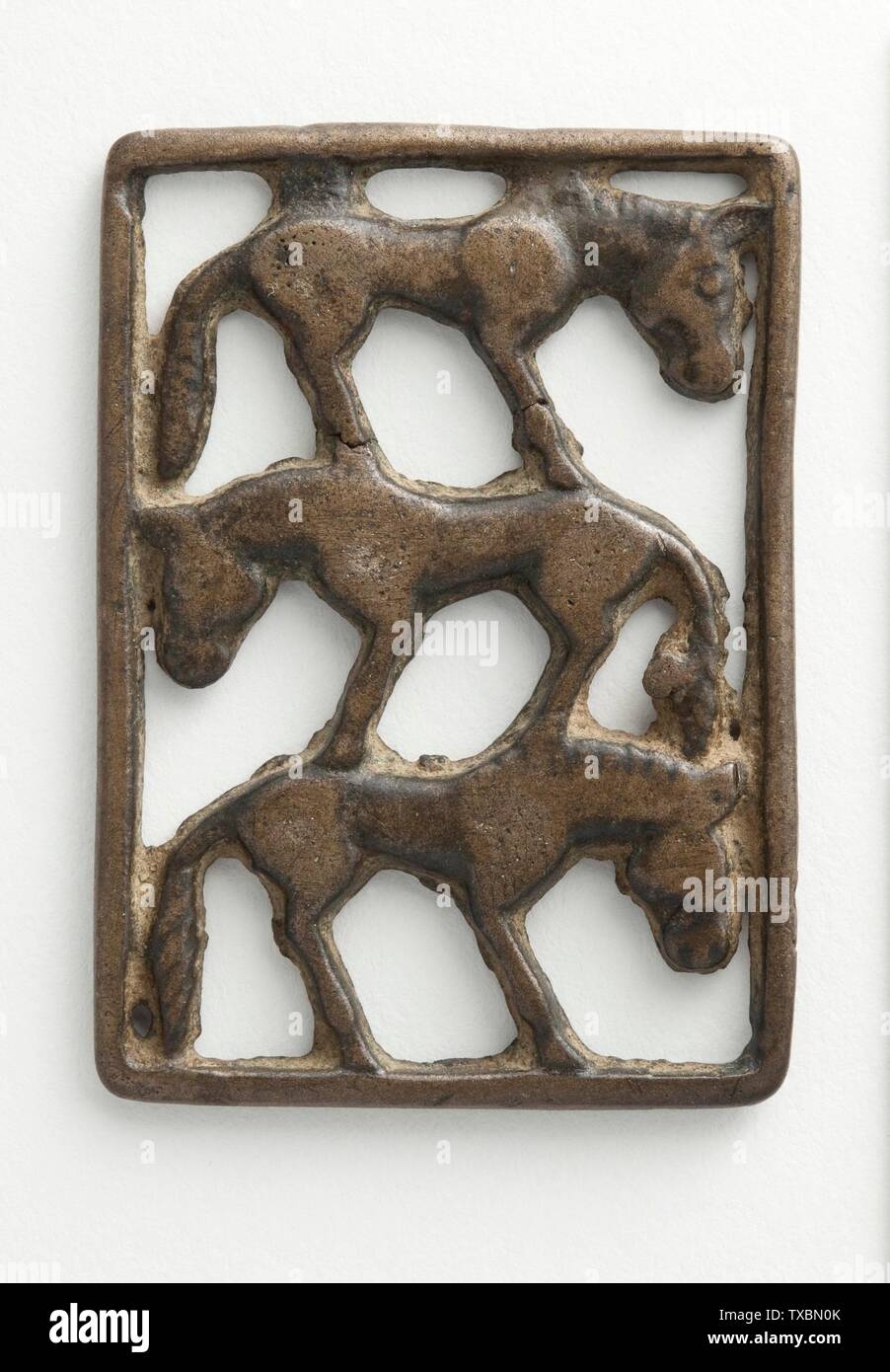 Plaque (Three Horses) (image 2 of 2);  Western Inner Mongolia or Northern China, 5th-4th century B.C. Sculpture; plaques Bronze The Nasli M. Heeramaneck Collection of Ancient Near Eastern and Central Asian Art, gift of The Ahmanson Foundation (M.76.97.697) Art of the Ancient Near East; 5th-4th century B.C.; Stock Photo