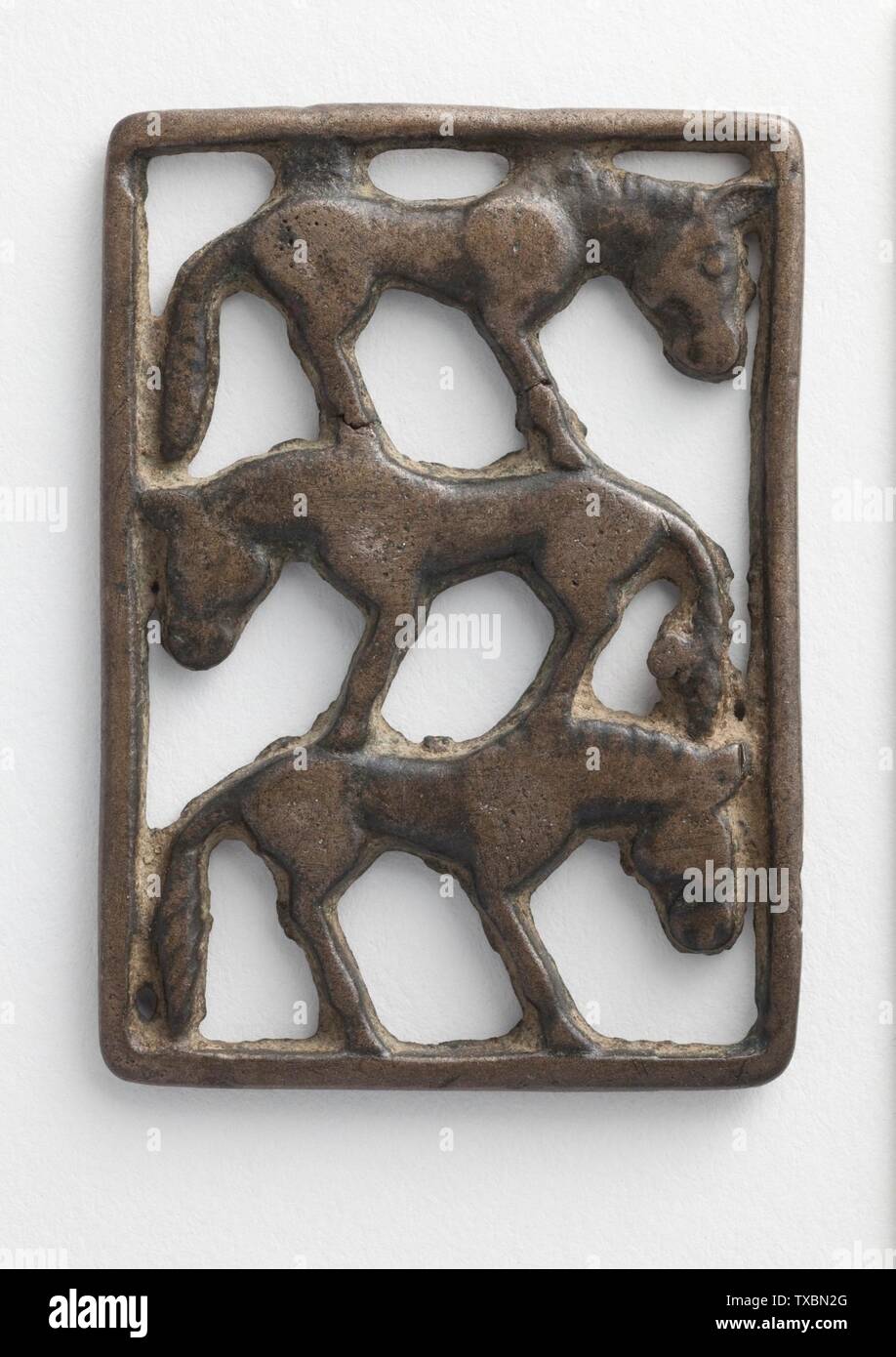Plaque (Three Horses) (image 1 of 2);  Western Inner Mongolia or Northern China, 5th-4th century B.C. Sculpture; plaques Bronze The Nasli M. Heeramaneck Collection of Ancient Near Eastern and Central Asian Art, gift of The Ahmanson Foundation (M.76.97.697) Art of the Ancient Near East; 5th-4th century B.C.; Stock Photo