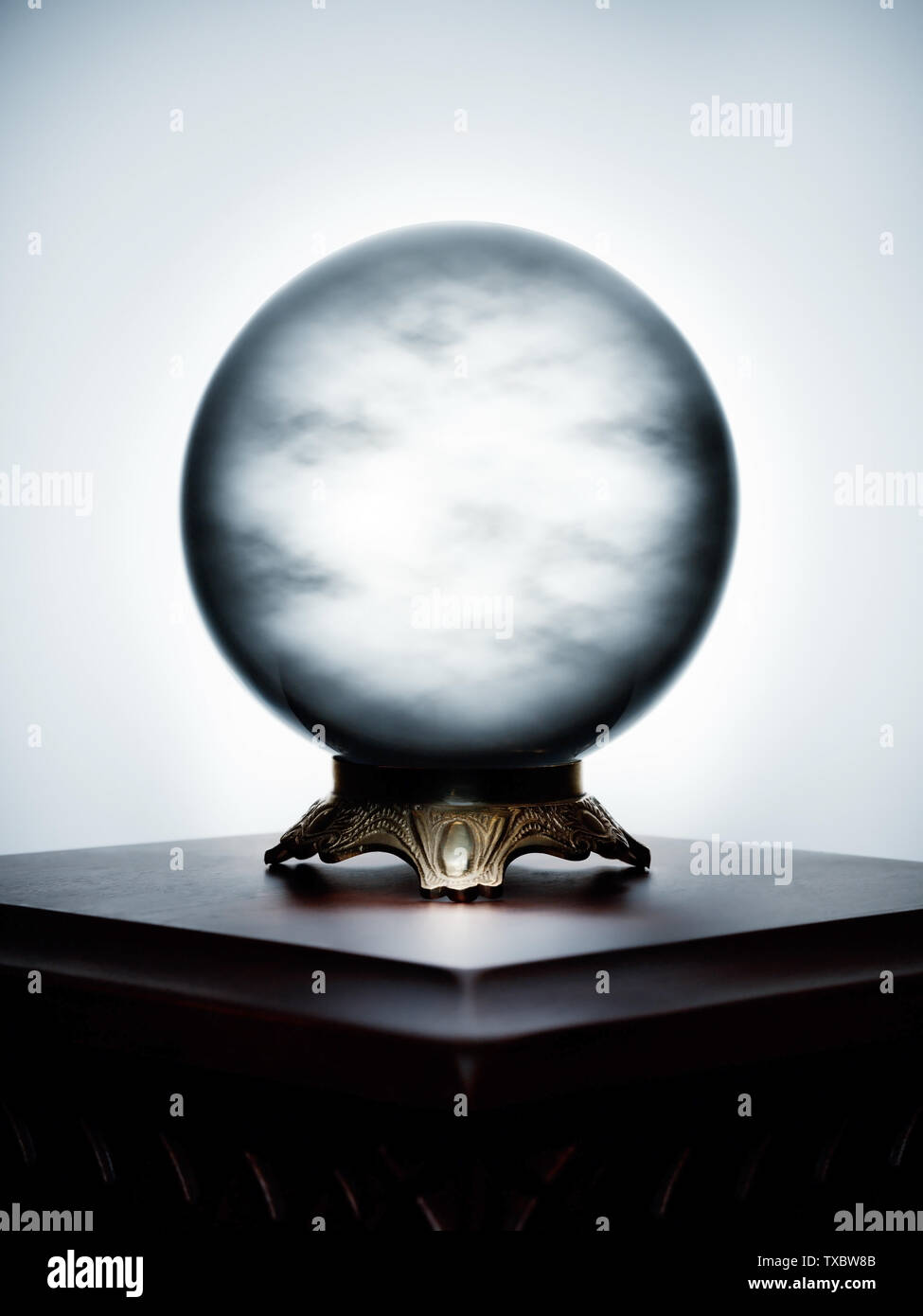 Hidden, cloudy crystal ball obscures the future Stock Photo