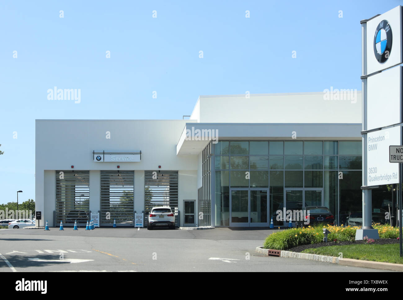 Princeton New Jersey - June 23, 2019:The brand "BMW" at a new car dealer  building in New Jersey, BMW is a German automobile, motorcycle and engine  man Stock Photo - Alamy