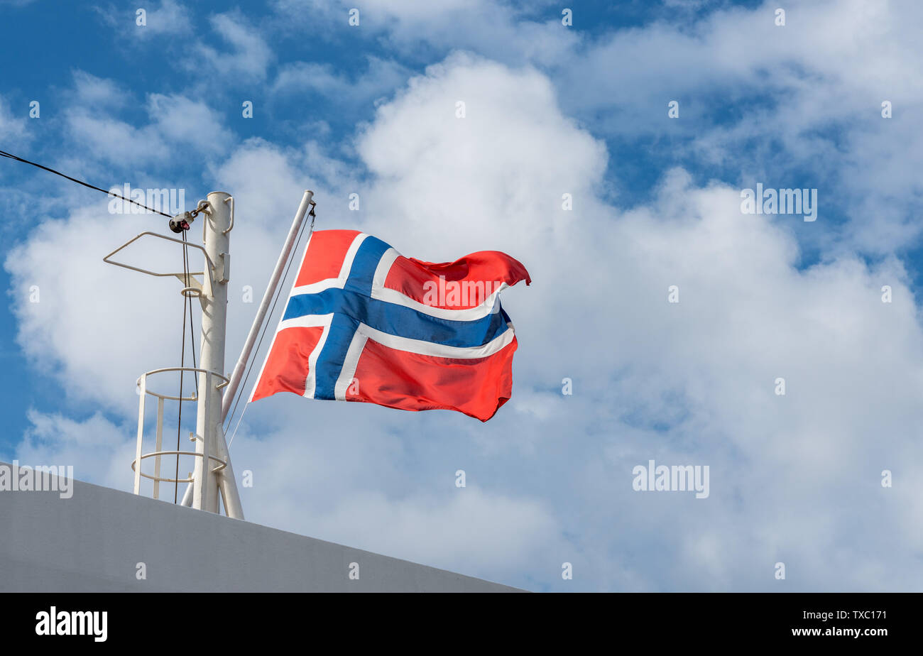 Norwegian flag flying from mast of cruise ship Stock Photo - Alamy