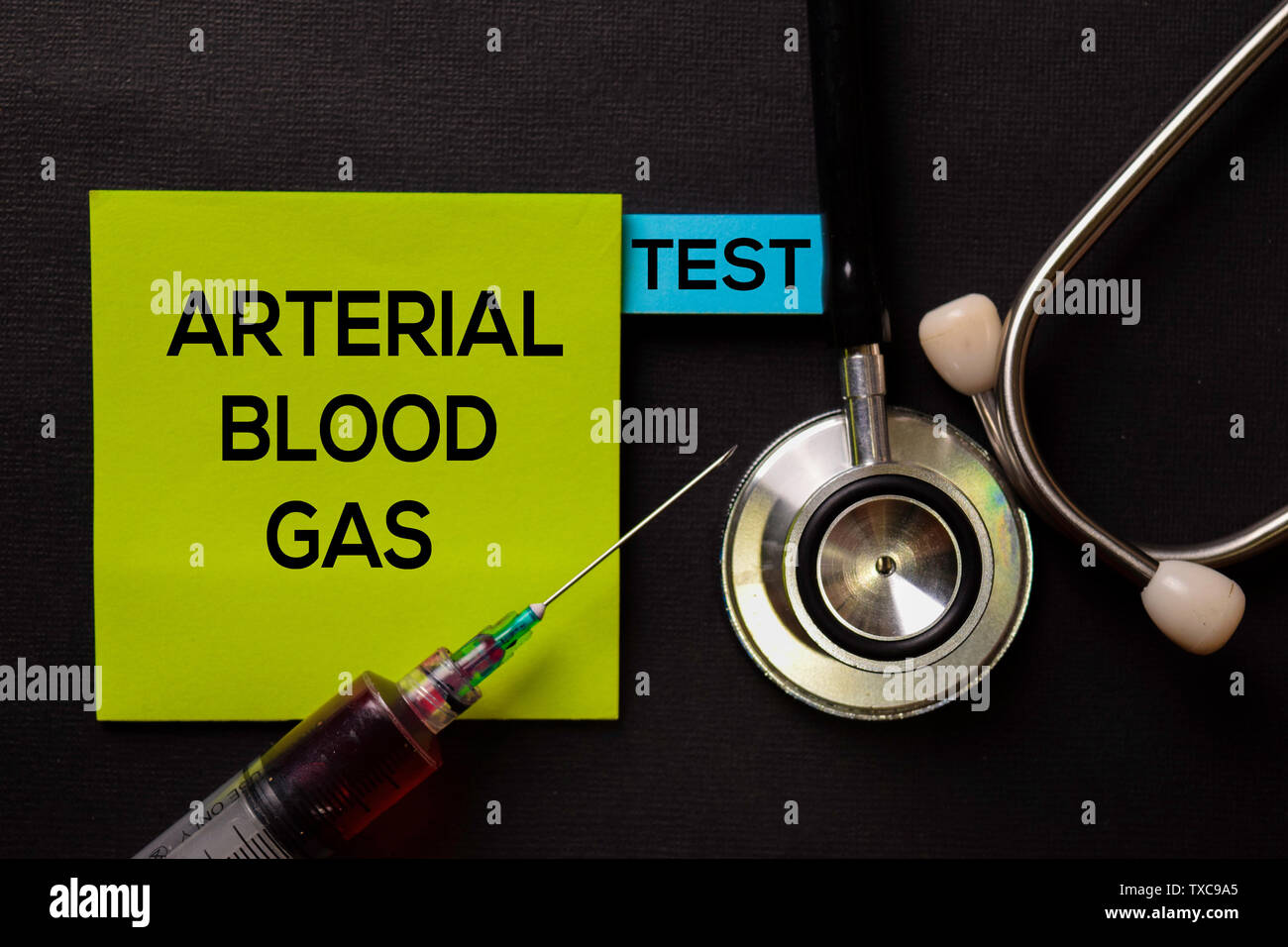 Arterial Blood Gas - Test on top view black table with blood sample and Healthcare/medical concept. Stock Photo