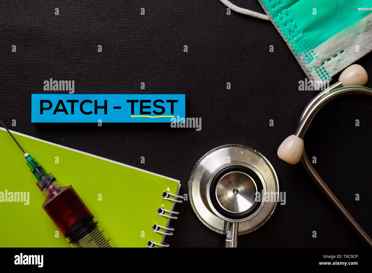 Patch - Test on top view black table with blood sample and Healthcare/medical concept. Stock Photo