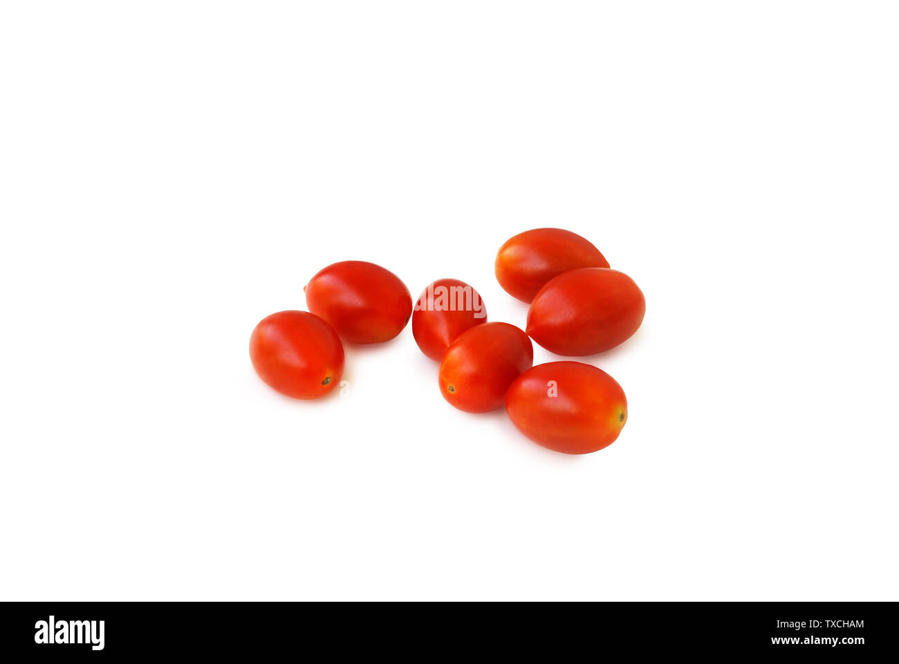 Cherry Tomatoes on white background.Lycopersicon esculentum Mill.Helps the body to fight asthma up to 45%.Help prevent dementia or Alzheimer's disease Stock Photo