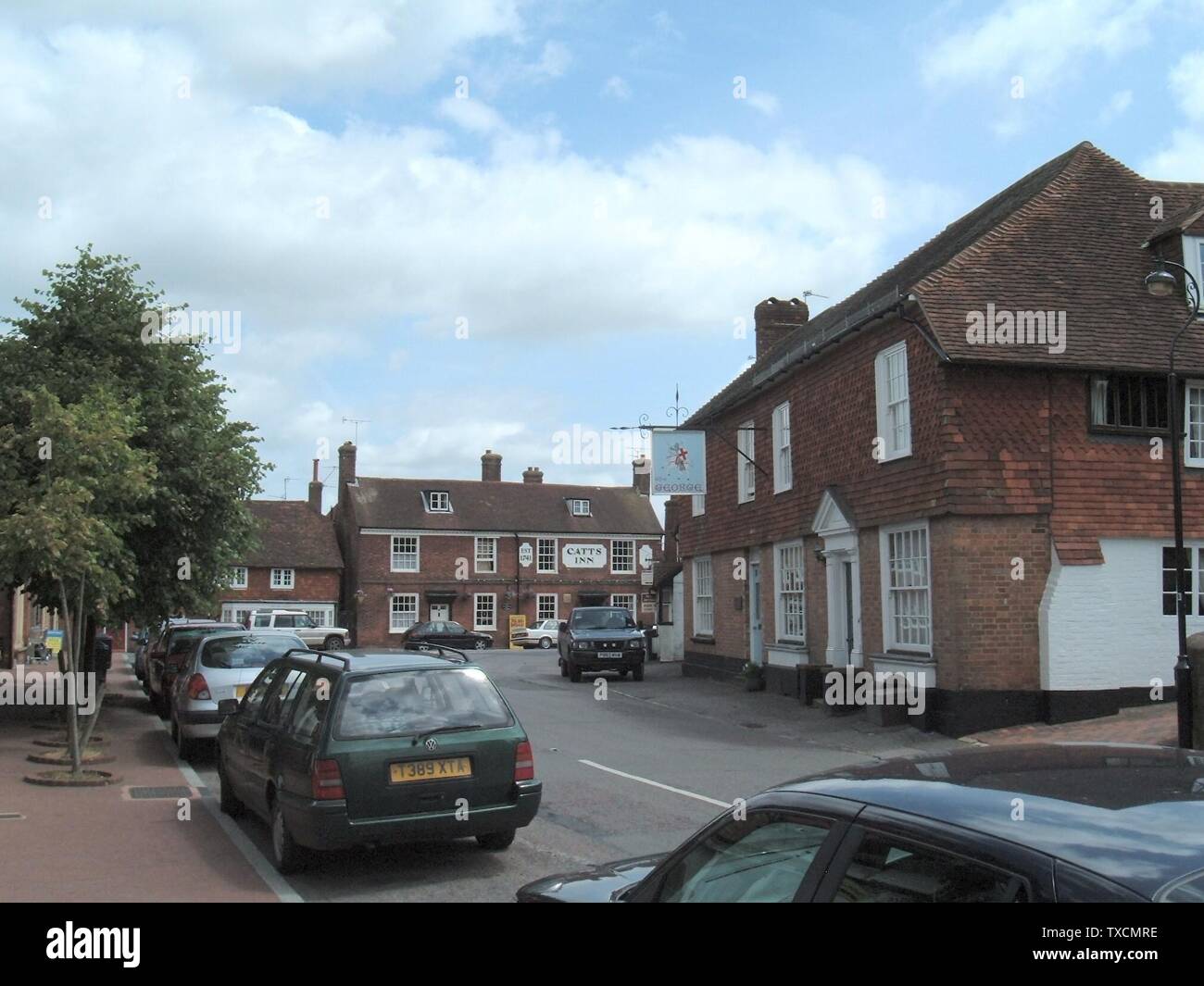 Main street through the village of rotherfield hires stock photography
