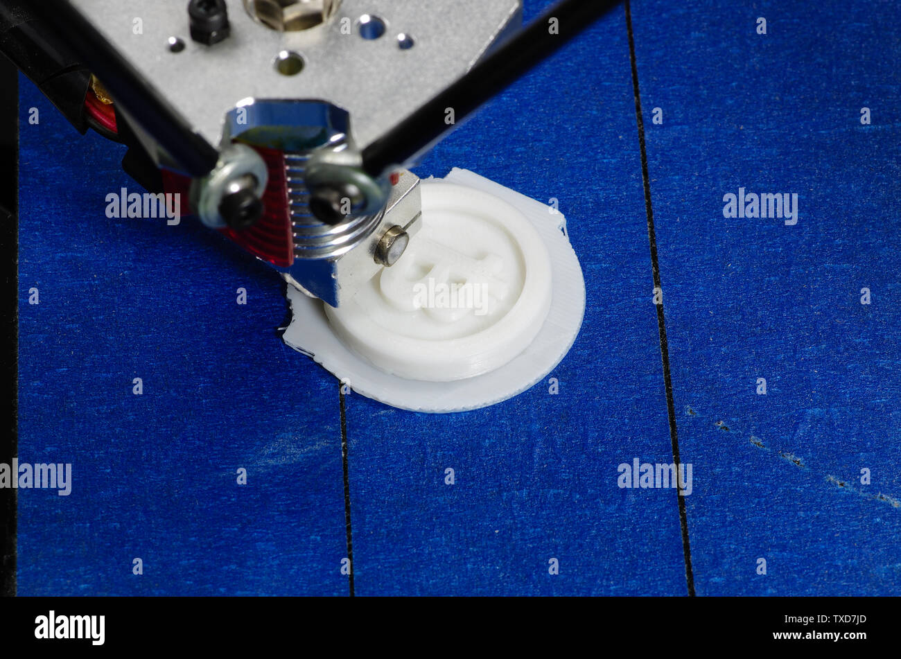 3D printer is printing bitcoin model Stock Photo