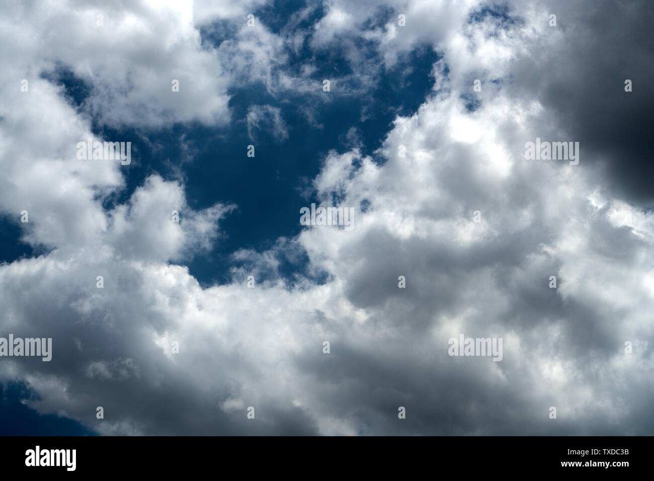 Dark storm clouds against blue sky. Sky before the storm Stock Photo ...