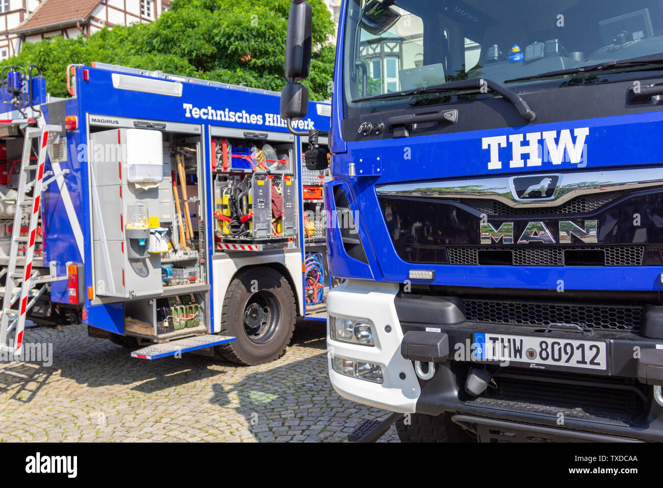 PEINE / GERMANY - JUNE 22, 2019: German technical emergency service trucks stands at public event, Day of the uniform. Technisches Hilfswerk, THW mean Stock Photo