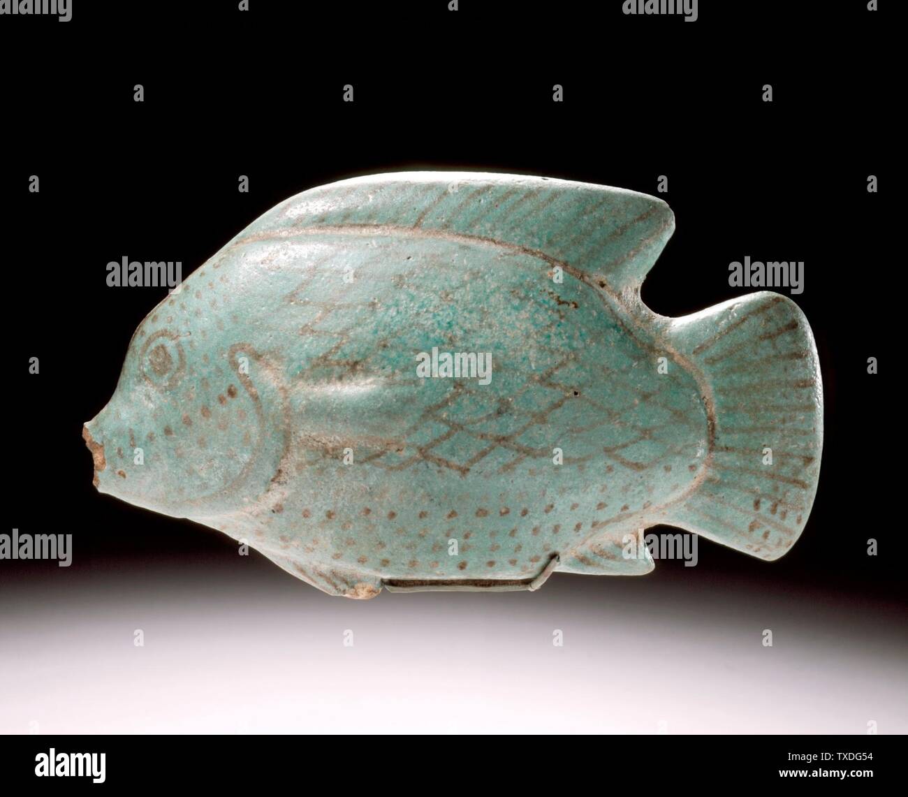 Vessel in the Form of a Fish; Egypt, 18th Dynasty, 1550 - 1307 B.C. Furnishings; Serviceware Faience Length: 7 7/8 in. (20.0 cm) Gift of the 1999 Collectors Committee (AC1999.57.1) Egyptian Art Currently on public view: Hammer Building, floor 3; 1550 - 1307 B.C.; Stock Photo