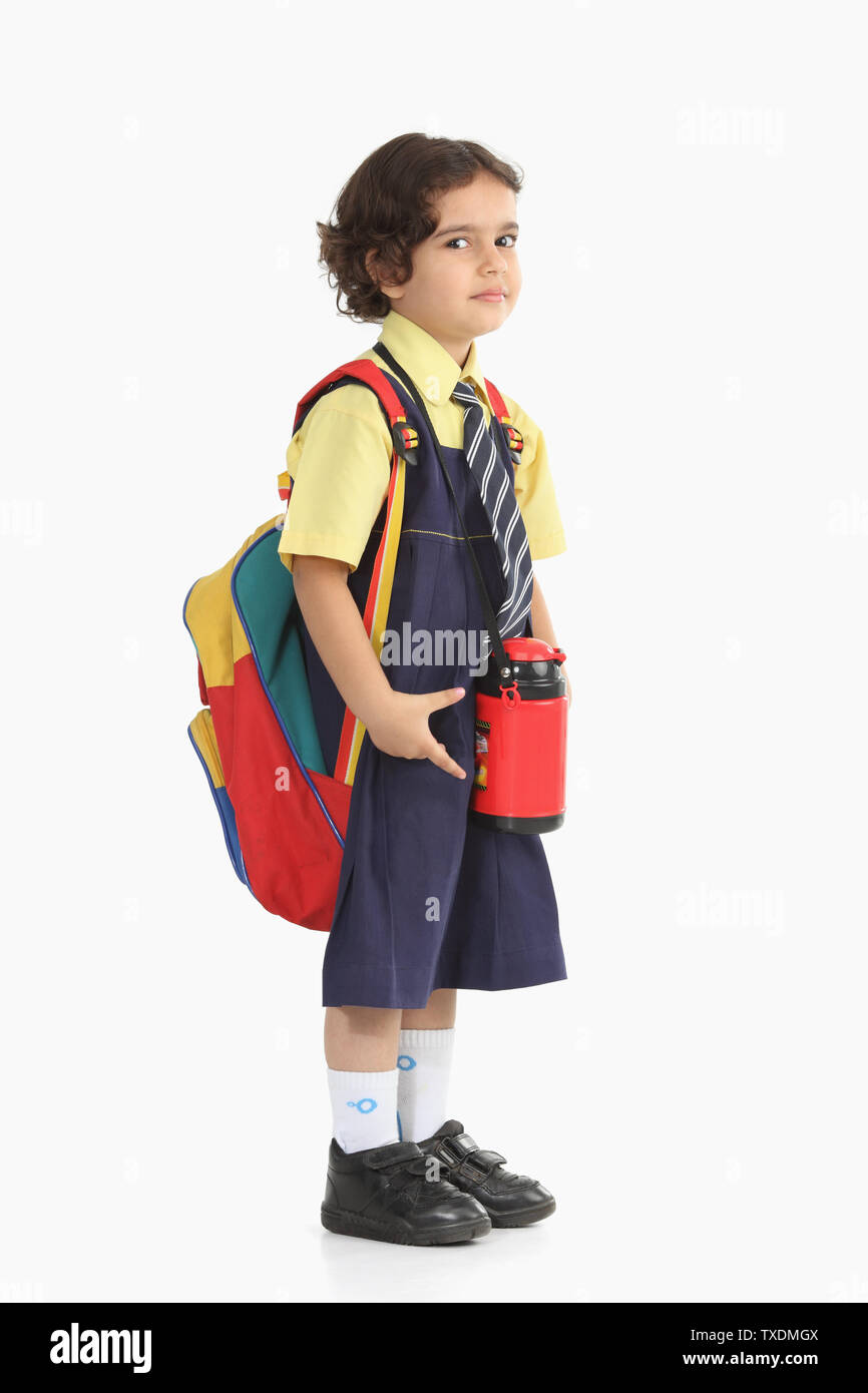 https://c8.alamy.com/comp/TXDMGX/portrait-of-a-girl-carrying-schoolbag-and-water-bottle-TXDMGX.jpg
