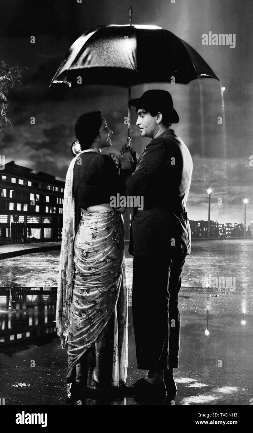 Indian Bollywood actor Raj Kapoor and actress Nargis in Hindi movie Shree 420, India, Asia, 1955, 1950s, 1900s, old vintage 1900s picture Stock Photo