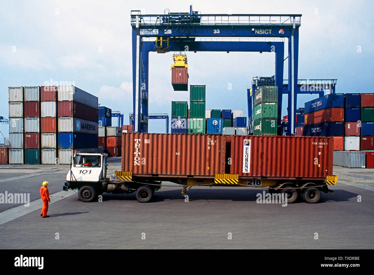 Stacking containers at JNPT container yard, Nhava Sheva, Navi Mumbai, India, Asia Stock Photo