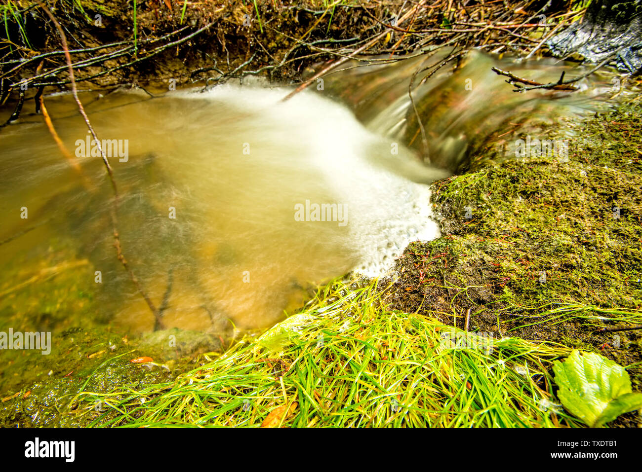 Small waterfall falling down in hi-res stock photography and images - Alamy