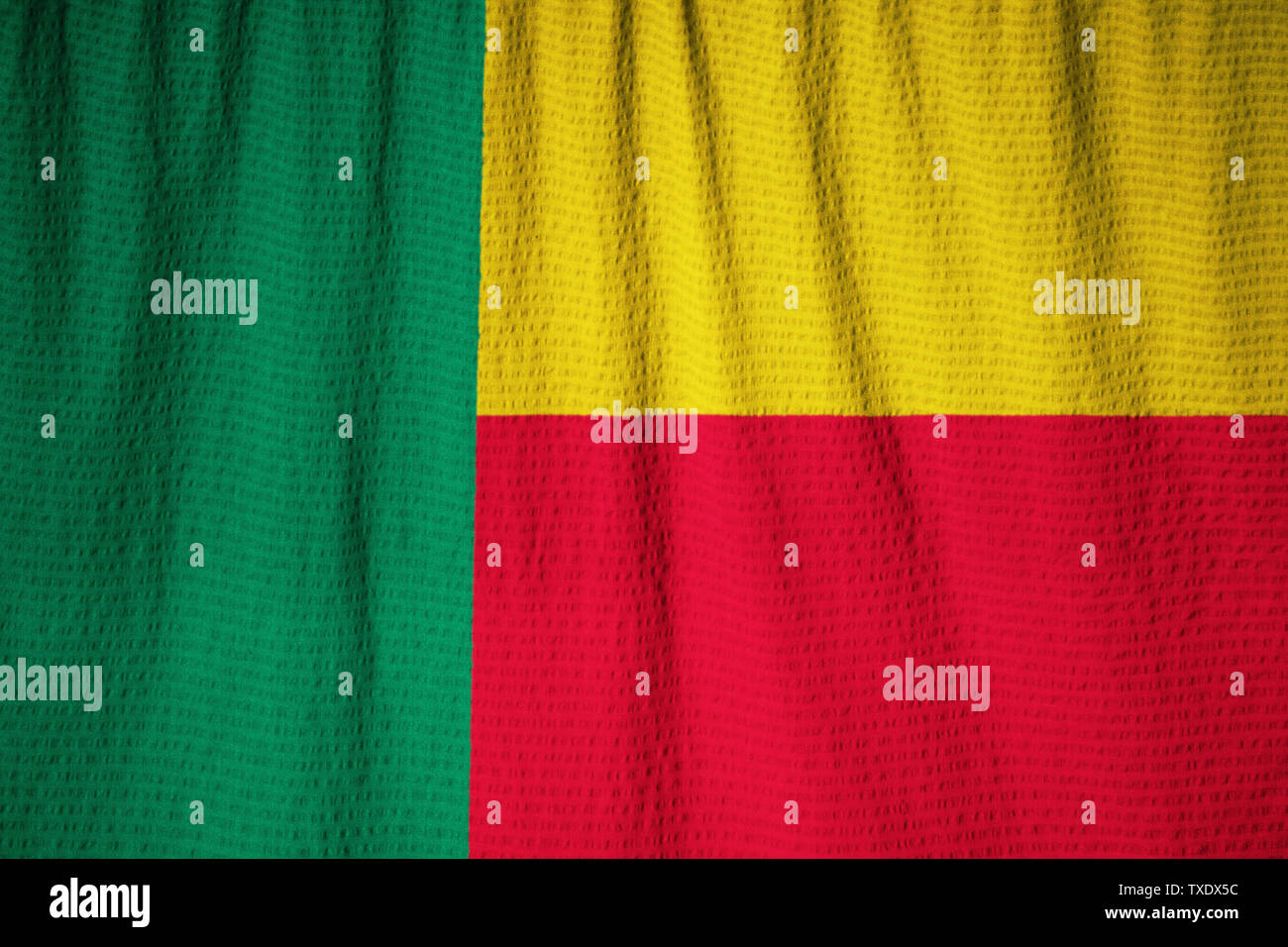 Ruffled Flag of Benin Blowing in Wind Stock Photo