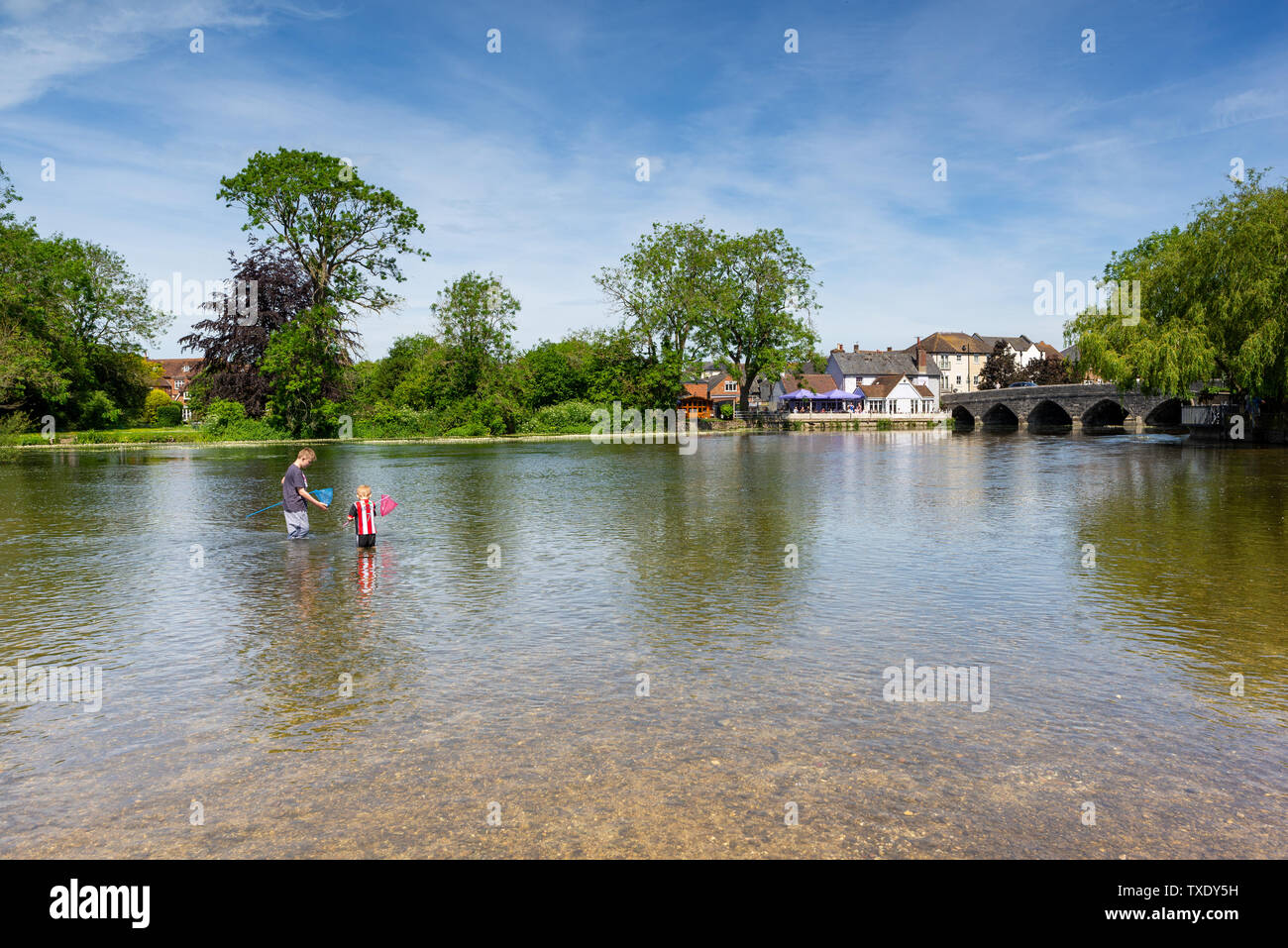 Two boys with fishing nets standing