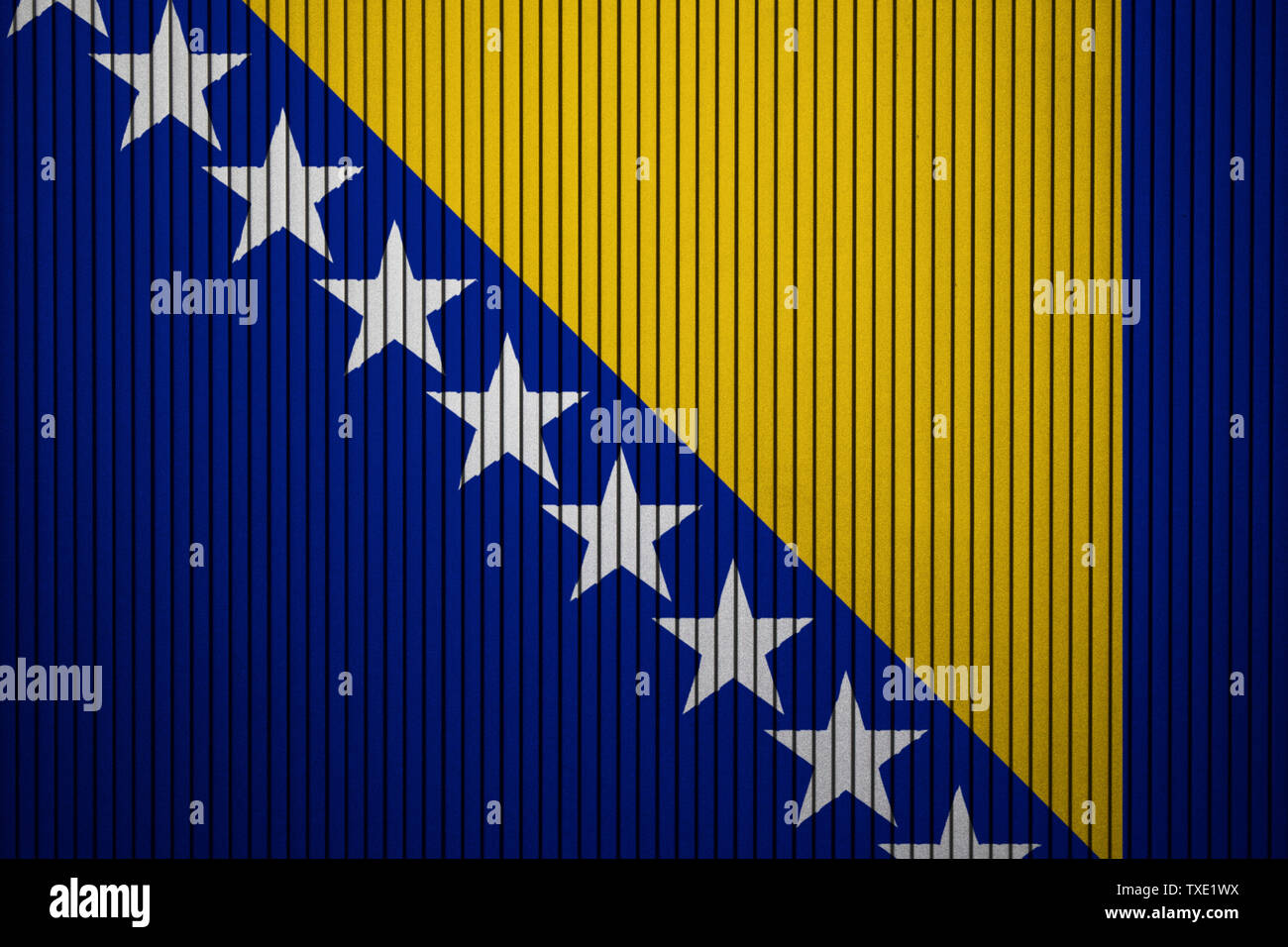 Bosnia and Herzegovina flag painted on the cracked grunge concrete wall Stock Photo