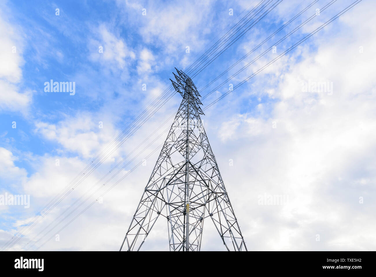 high voltage pole with blue sky Stock Photo - Alamy