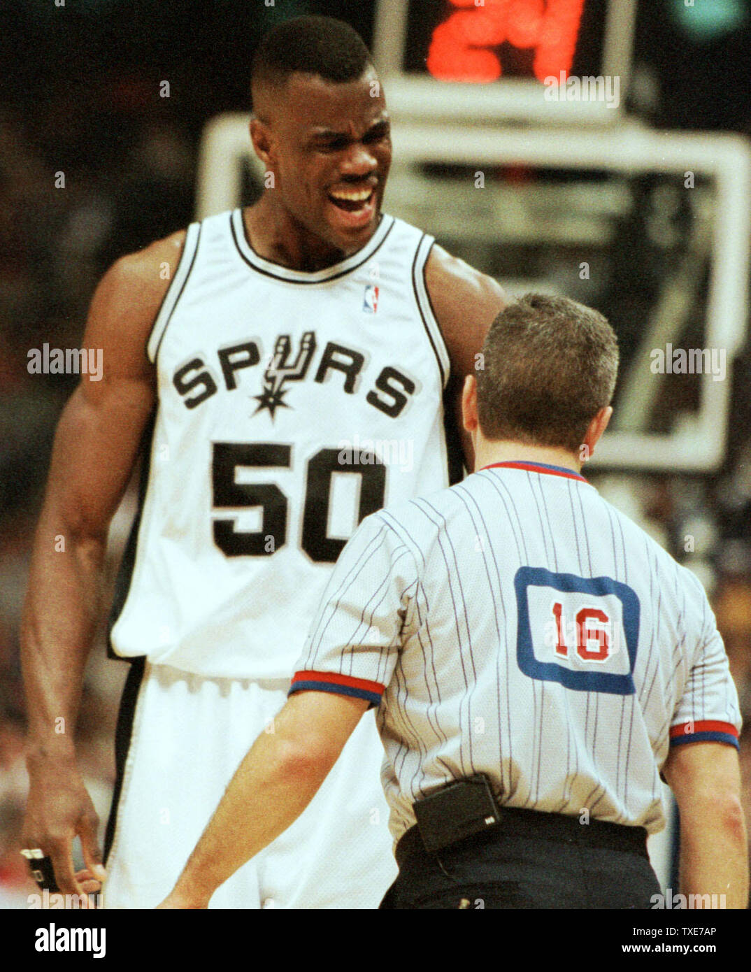 SAP2000010803 - 08 JANUARY 2000 - SAN ANTONIO, TEXAS, USA: David Robinson of the San Antonio Spurs reacts to being called for a foul by the official, January 8. The Spurs defeated the Orlando Magic at the Alamodome 127-92. rg/jm/Joe Mitchell  UPI Stock Photo