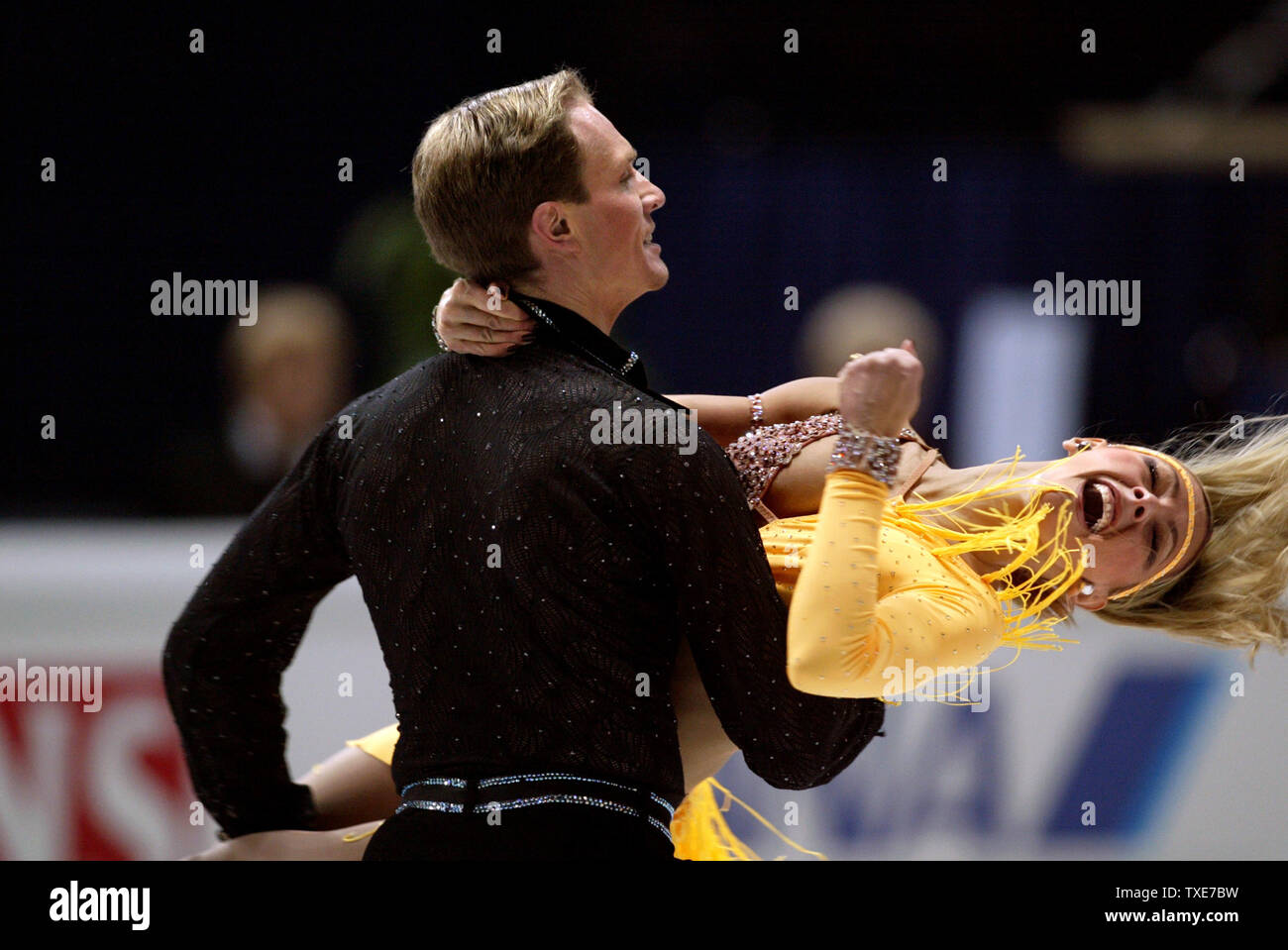 (L-R) ROMAN KOSTOMAROV and TATIANA NAVKA of Russia compete in Ice Dancing and currently hold 1st place at 2004 World Figure Skating Champions through til Sunday. UPI Photo/Tom Theobald Stock Photo