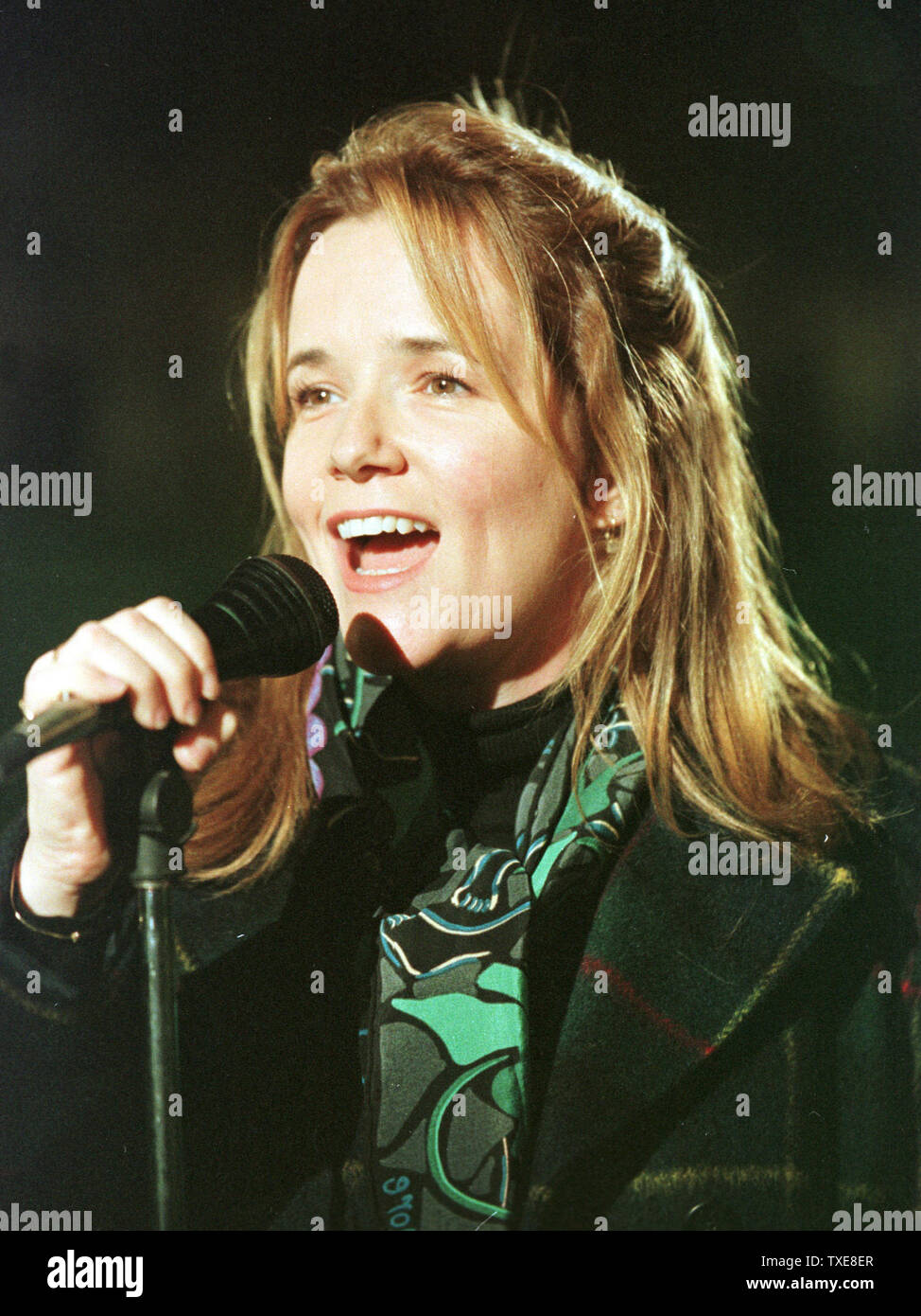 SLP2000011604 - 16 JANUARY 2000 - ST. LOUIS, MISSOURI, USA: Actress Lea Thompson sings her rendition of the National Anthem prior to the Divisional Playoff game between the St. Louis Rams and the Minnesota Vikings in St. Louis at the Trans World Dome, January 16. rg/bg/Bill Greenblatt  UPI Stock Photo