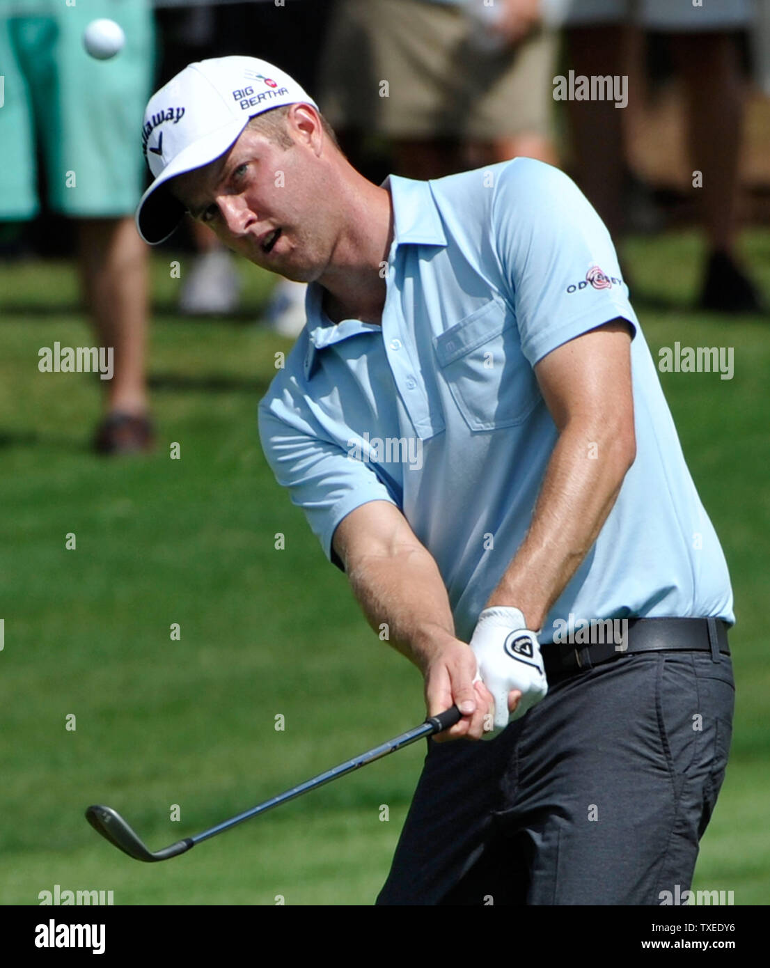Chris Kirk chips to No. 16 where he cards a par and finishes the round in a  three-way tie for second place with Rory McIlroy and Jason Day, two-strokes  off leader Billy