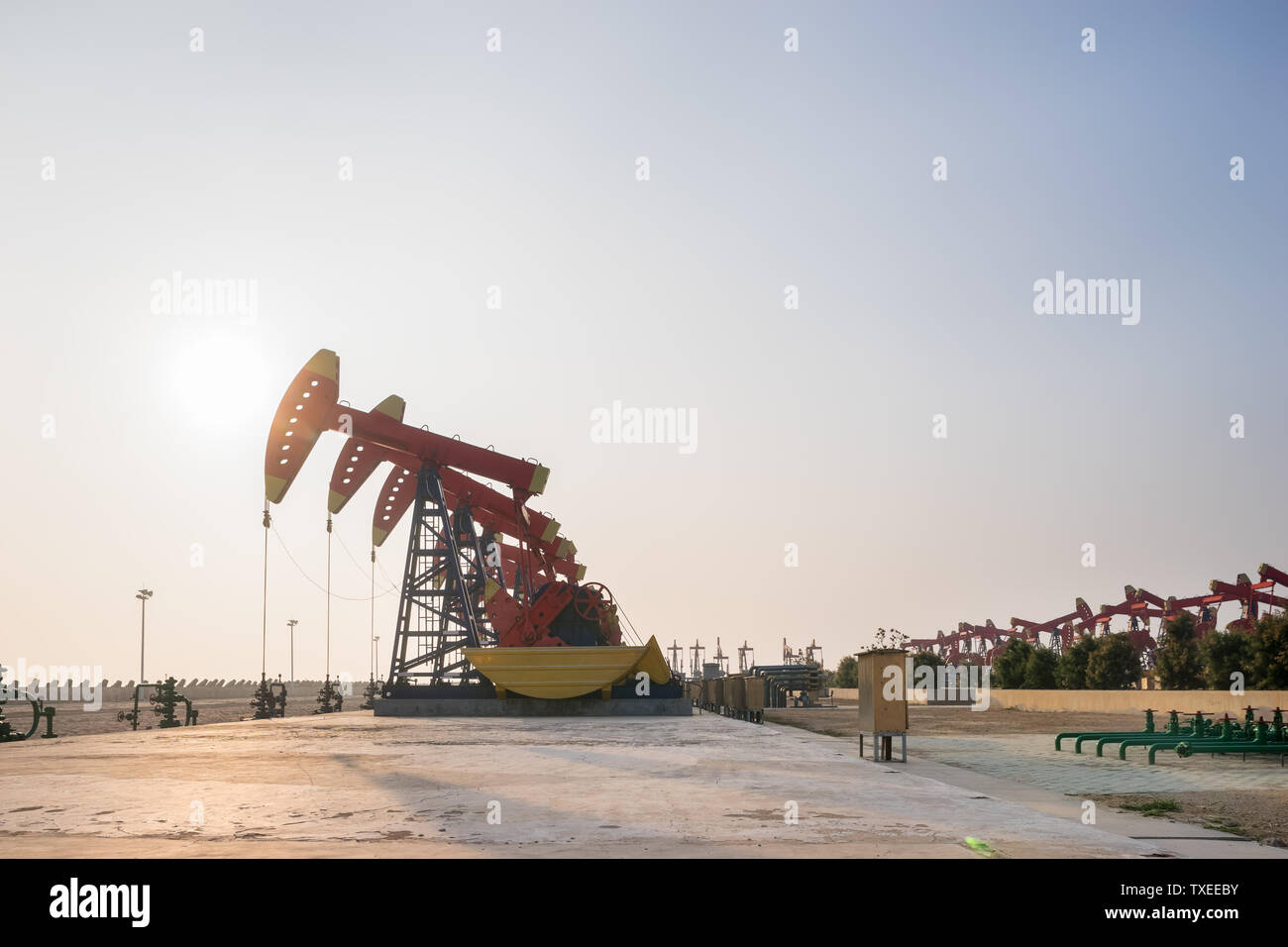 working oilrig in oilfield in clear sky Stock Photo Alamy