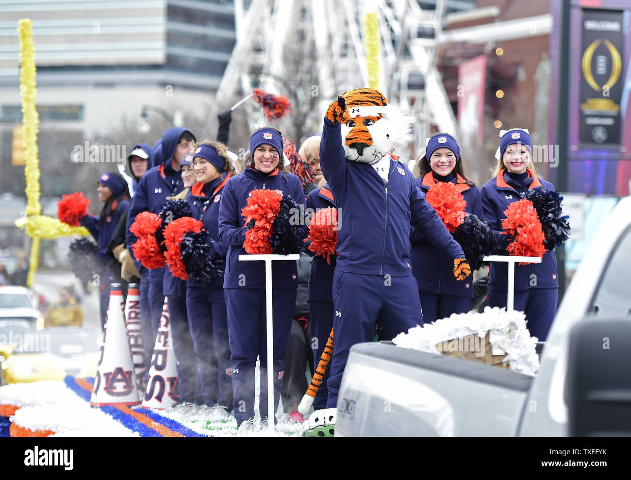 Auburn University's mascot joins school members during the Peach Bowl