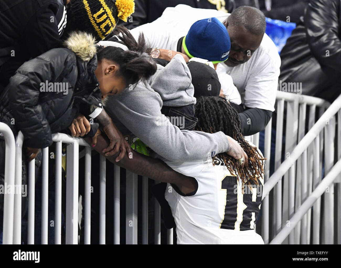 University of Central Florida Knights linebacker Shaquem Griffin (18) hugs his family before the Chick-fil-A Peach Bowl NCAA college football game at the Mercedes-Benz Stadium in Atlanta on January 1, 2018. Photo by David Tulis/UPI Stock Photo