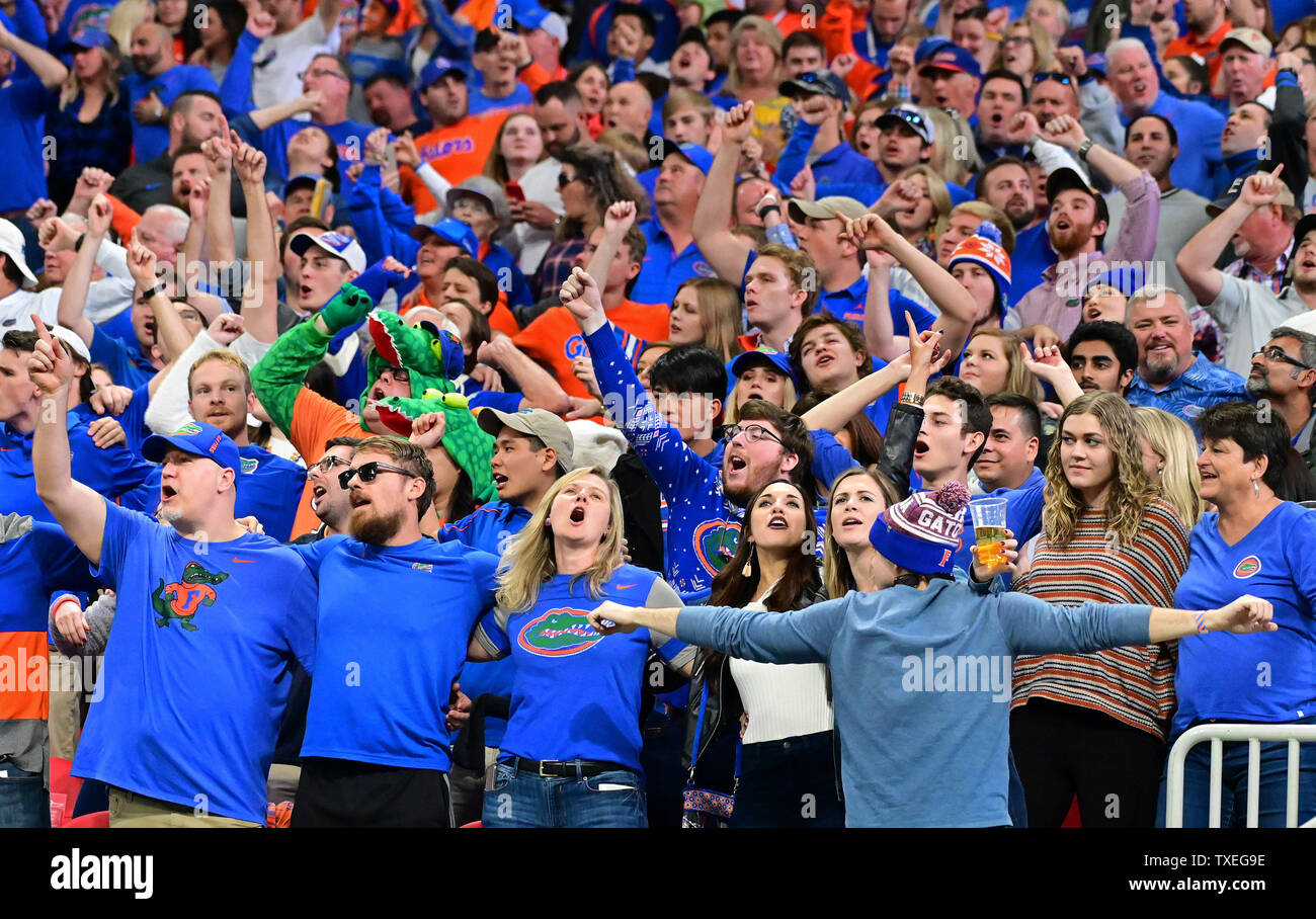 Florida Gators fans cheer during the second half of the Chick-fil-A ...