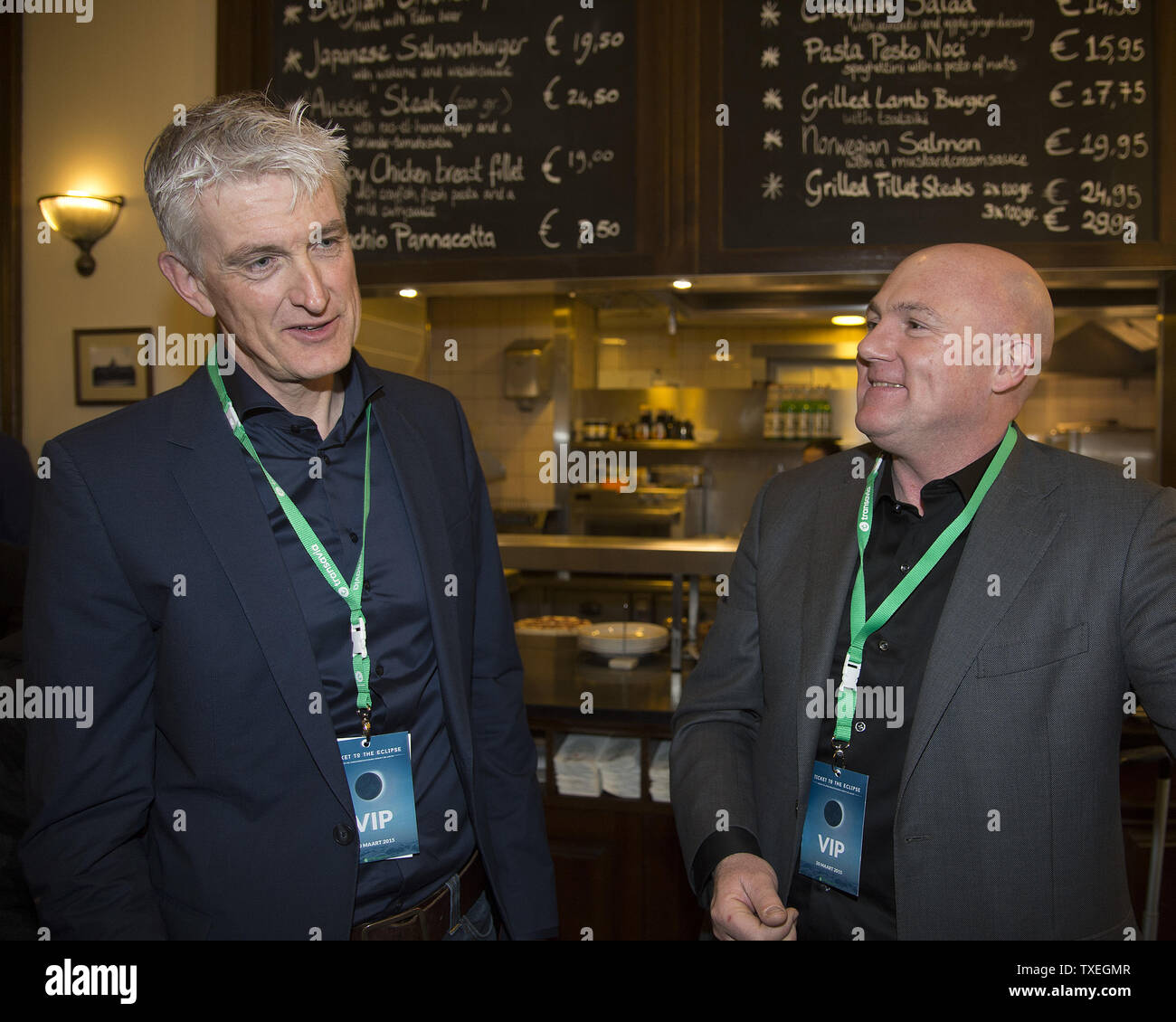 Mattijs ten Brink (l), CEO of Dutch carrier, Transavia and Dutch Astronaut,  Andre Kuipers meet at Schiphol Airport in Amsterdam, The Netherlands on  March 20, 2015. Transavia sponsored a special flight for