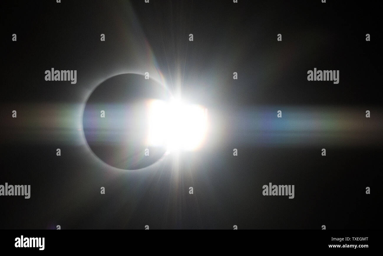 A total solar eclipse is viewed while flying on board a special flight operated by Transavia, from Schiphol Airport in Amsterdam, The Netherlands on March 20, 2015. A solar eclipse occurs when the orbit of the moon places it directly between the sun and earth. The moon's shadow darkens the skies for approximately two to three minutes as it traces a northerly path across the North Atlantic between Iceland and the European continent toward the north pole .  Photo by Joe Marino/UPI Stock Photo