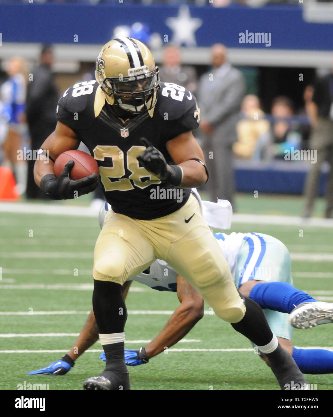 New Orleans Mark Ingram rushes against the Dallas Cowboys Tony Romo ...