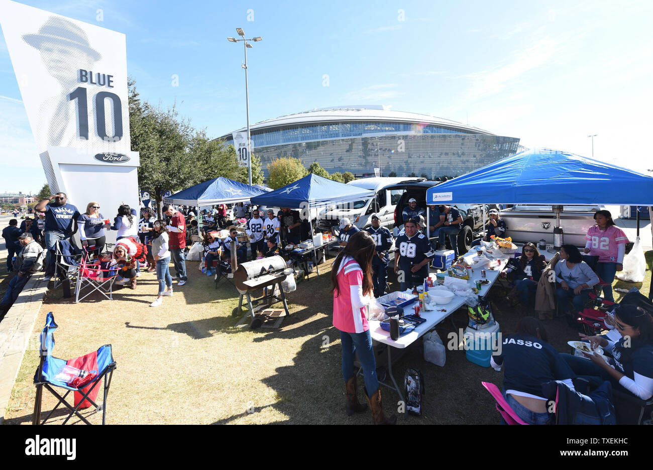 Fans celebrate Thanksgiving tailgating prior to the Dallas Cowboys and
