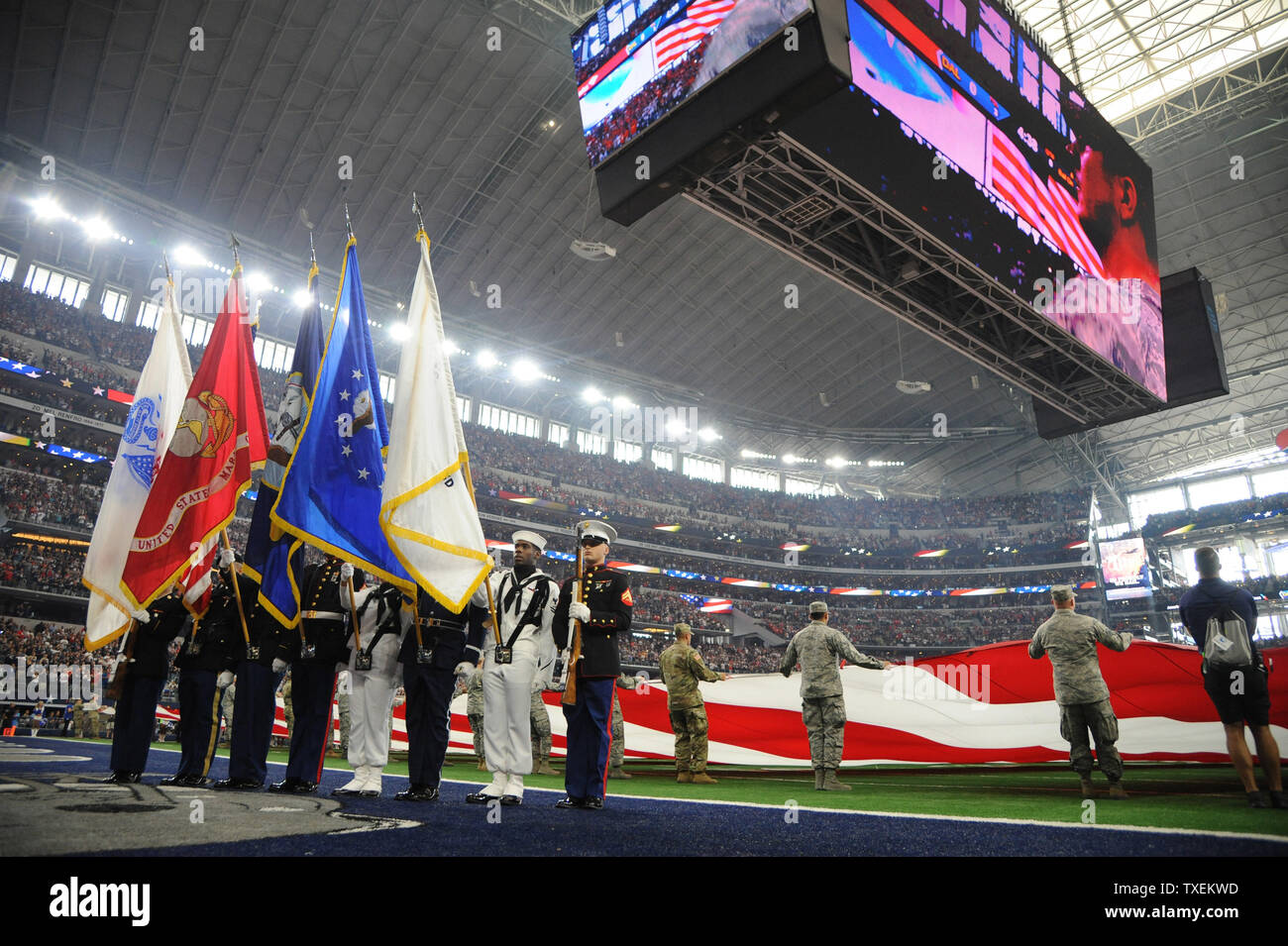 A Color Guard representing all brances of the United States Armed Services presents the Colors prior to the Dallas Cowboys and Kansas City Chiefs game at AT&T Stadium in Arlington, Texas on November 5, 2017.  Photo by Ian Halperin/UPI Stock Photo