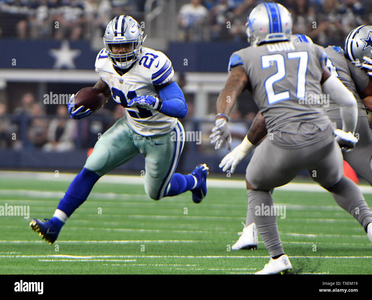 September 30, 2018: Dallas Cowboys running back Ezekiel Elliott #21 during  an NFL football game between the Detroit Lions and the Dallas Cowboys at  AT&T Stadium in Arlington, TX Dallas defeated Detroit