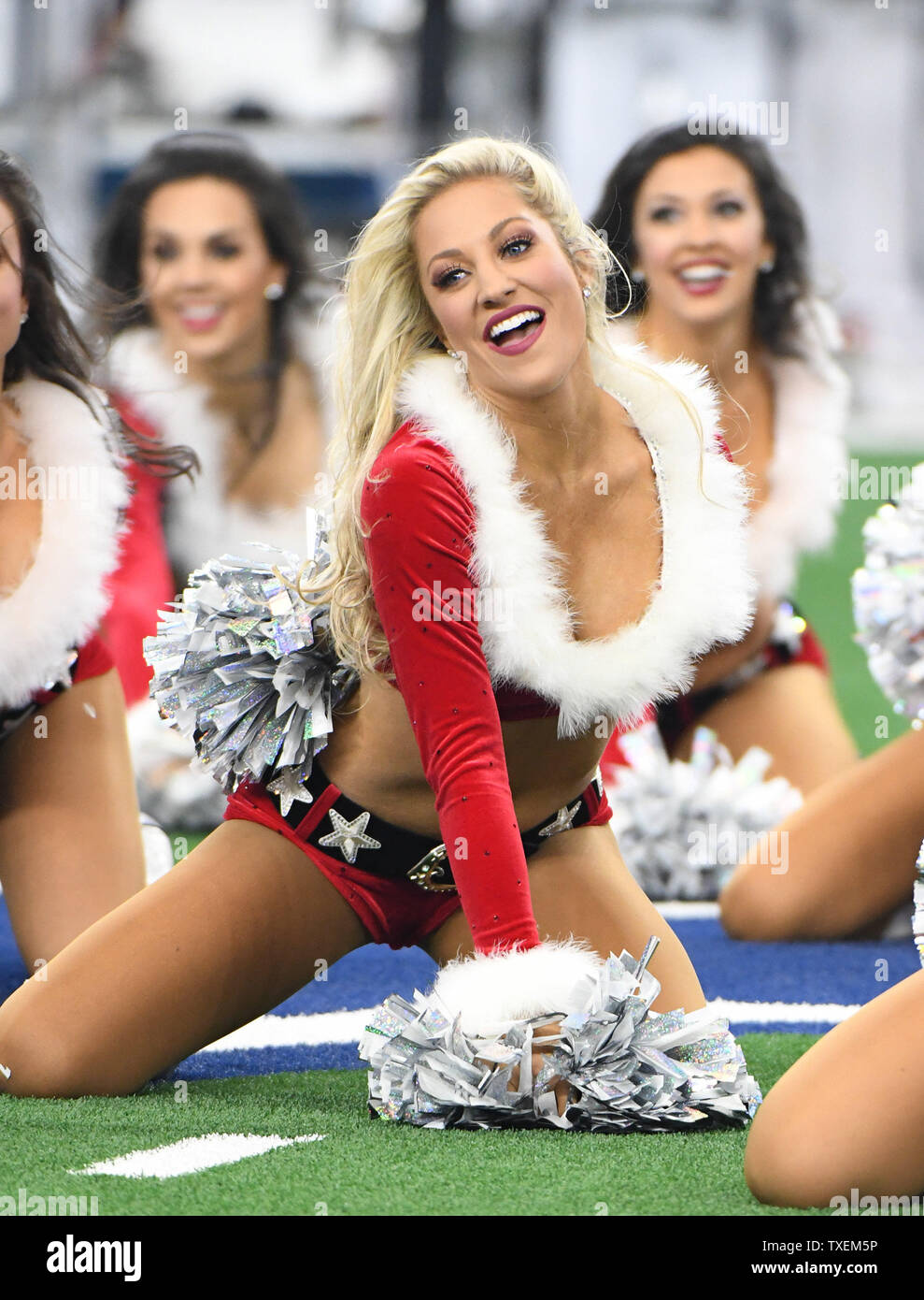 The Dallas Cowboys Cheerleaders perform their annual Christmas