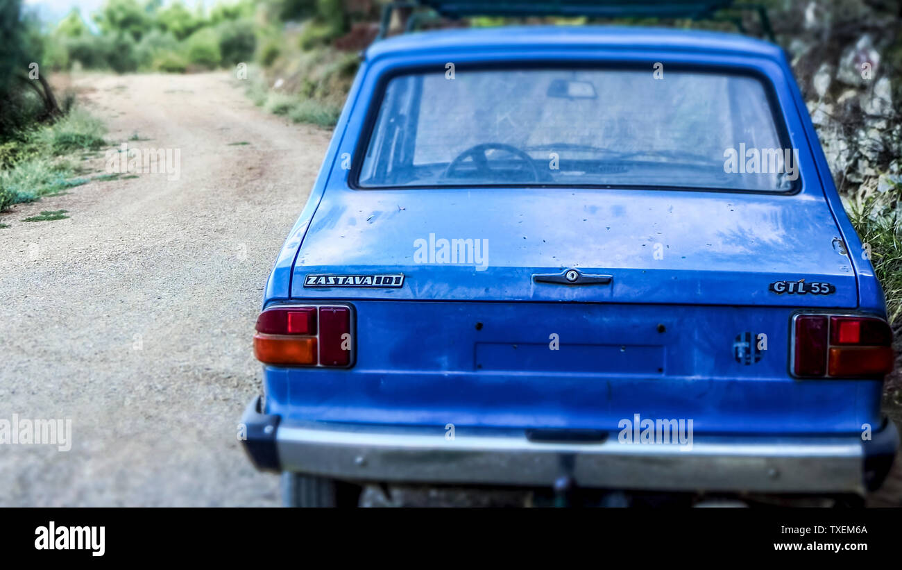 Blue and lonley Zastava Car GTL 55 on an empty Path within the Biokovo Mountains in Makarska, Croatia Stock Photo