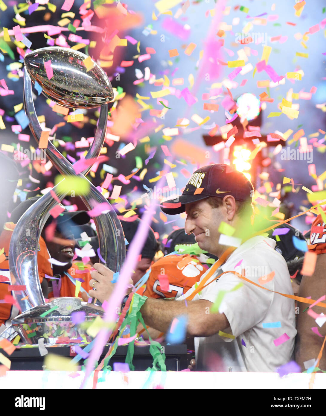 Clemson head coach Dabo Swinney pick up the Field Scovell Trophy after beating Notre Dame 30-3 in the College Football Playoff Semifinal at the Goodyear Cotton Bowl Classic at AT&T Stadium in Arlington, Texas on December 29, 2018. The Tigers will face the winner of the CFP Semifinal at the Capital One Orange Bowl in the National Championship Game on January 7, 2019. Photo by Ian Halperin/UPI Stock Photo