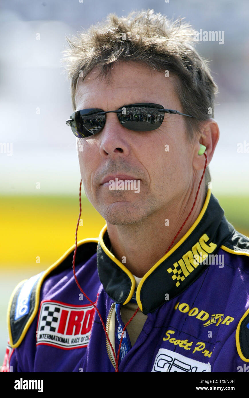 Grand American Road Racing driver Scott Pruett awaits the start of the ...