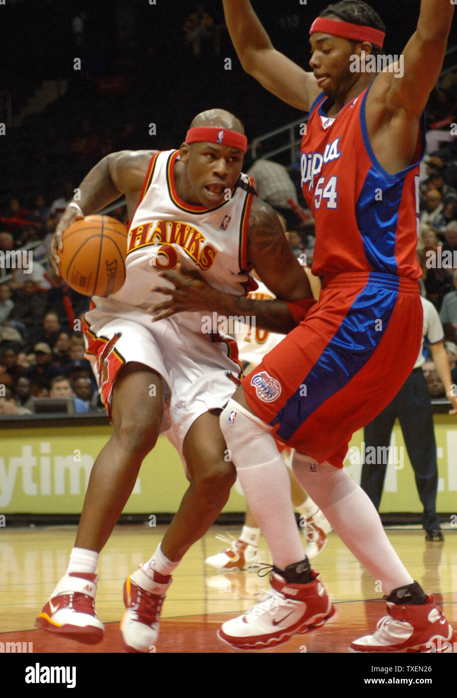 Atlanta Hawks forward Al Harrington wears shoes with Still With Us in honor of teammate Jason Collier during a preseason game against the Charlotte Bobcats at the Charlotte Coliseum in Charlotte N.C