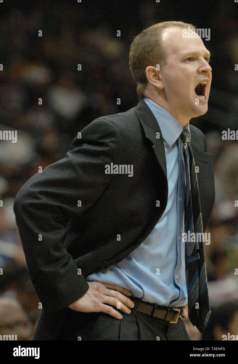 New Jersey Nets head coach Lawrence Frank shouts instructions to his