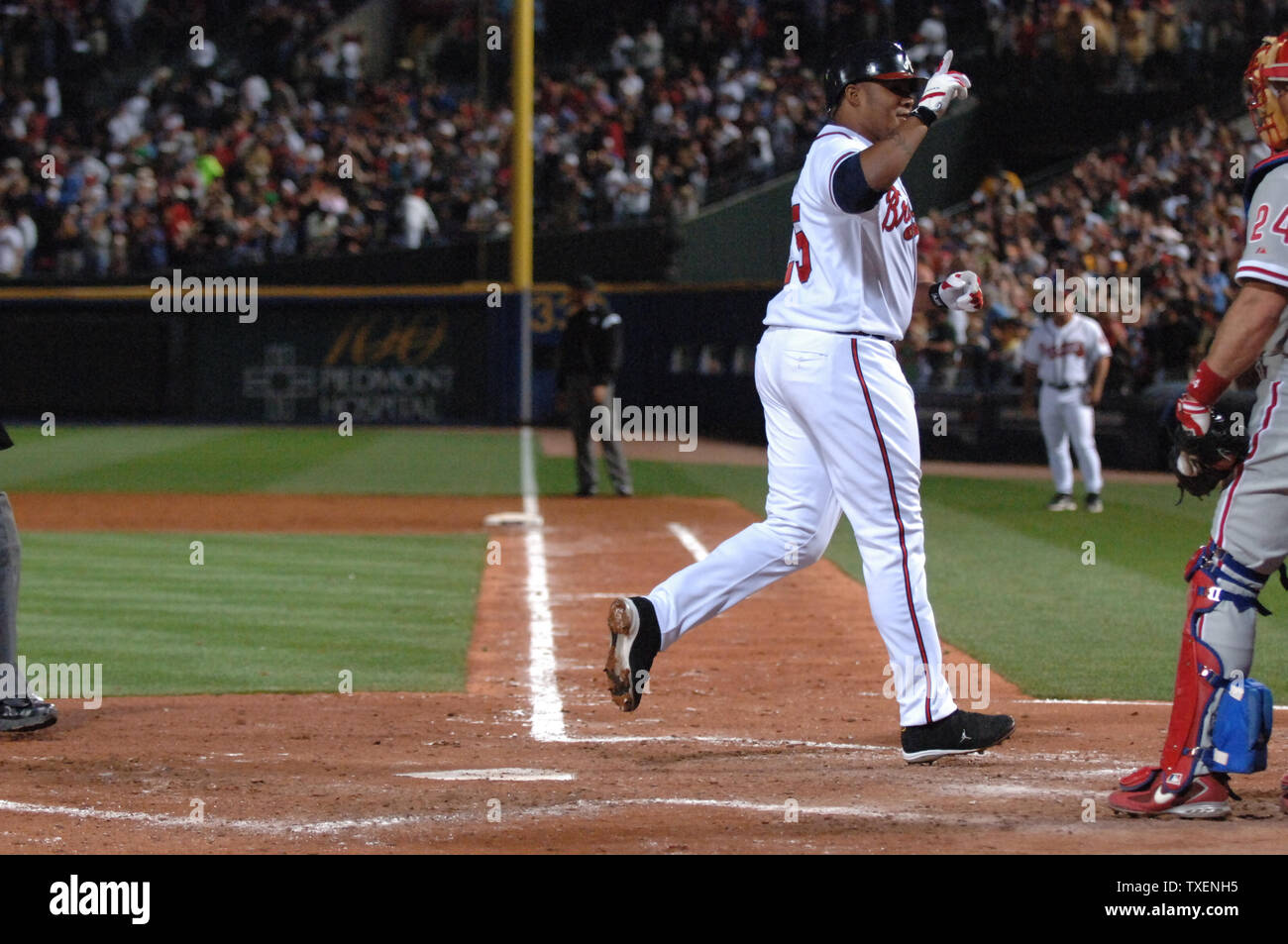 Atlanta Braves Andruw Jones, wearing the number 42 in honor of the 60th  anniversary of Jackie Robinson, warms up to hit in in the second inning at  Turner Field in Atlanta, April