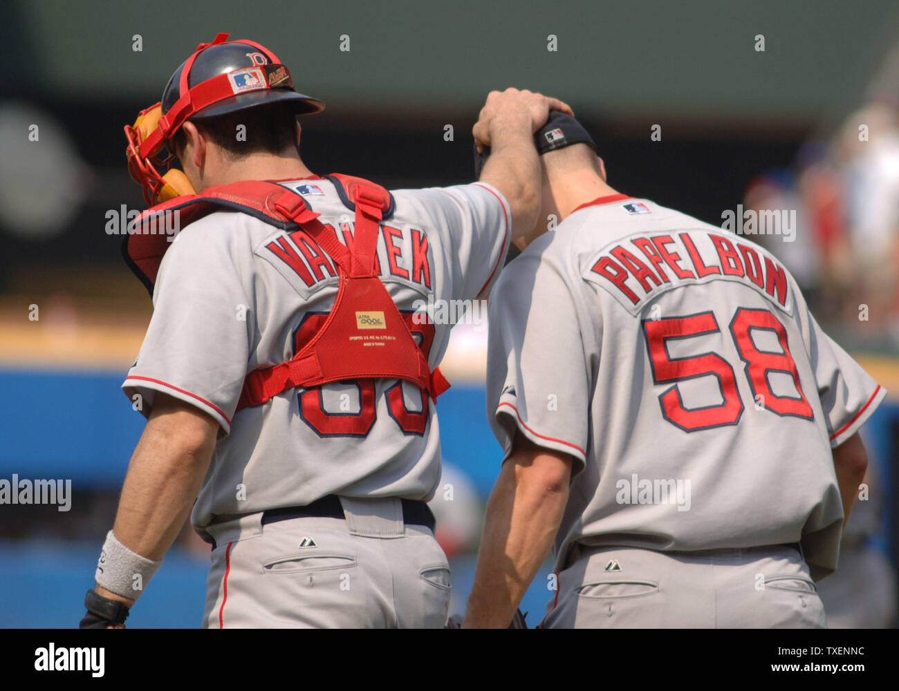 Boston Red Sox catcher Jason Varitek congratulates closing pitcher Jonathan Papelbon at the end of the ninth inning June 17, 2006, in Atlanta's Turner Field. The Red Sox defeated the Braves 5-3 (UPI Photo/John Dickerson Stock Photo