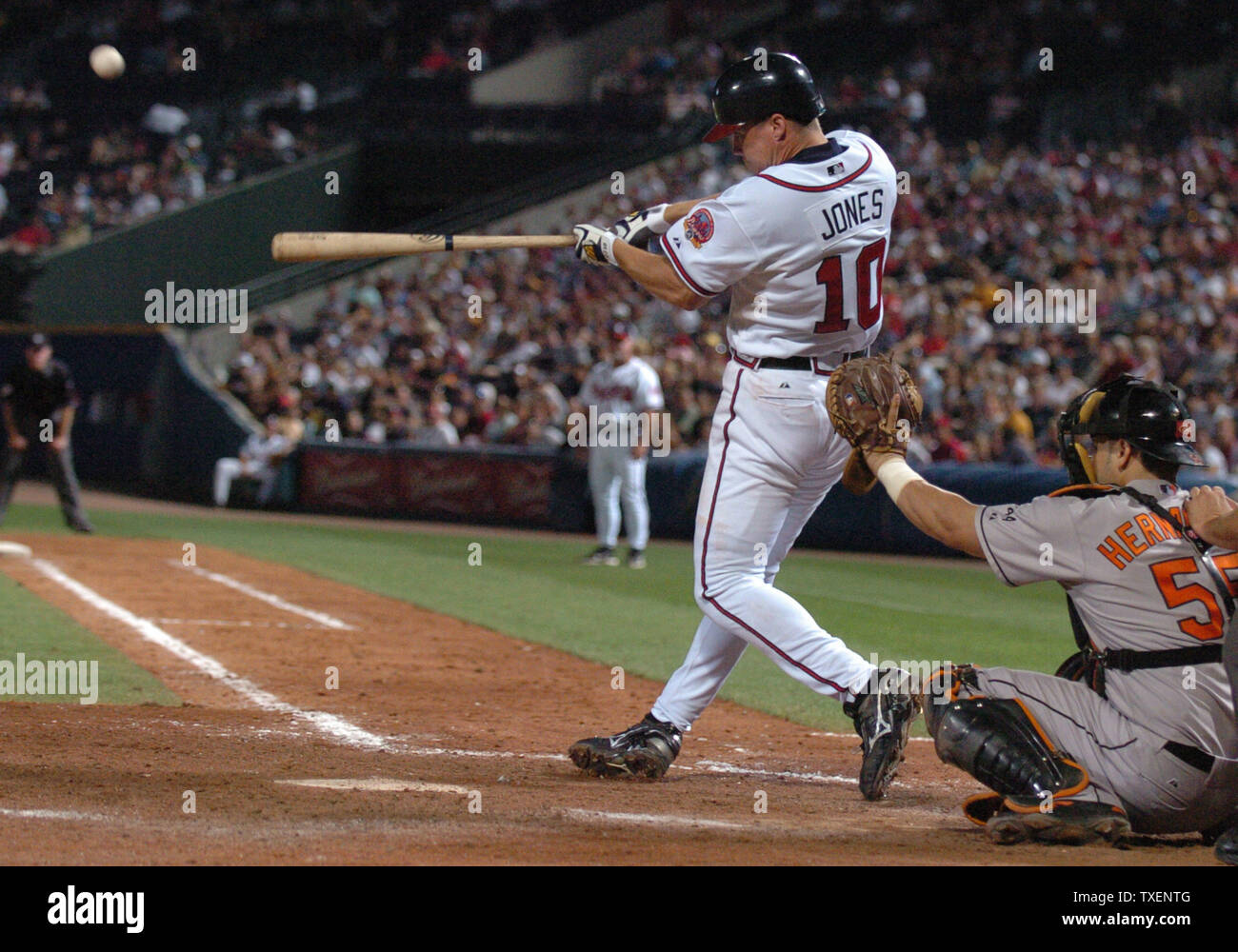 Atlanta Braves Chipper Jones lofts a solo home run in the ninth inning of  play against the Baltimore Orioles July 1, 2006, in Atlanta's Turner Field.  The Orioles defeated the Braves 7-4. (