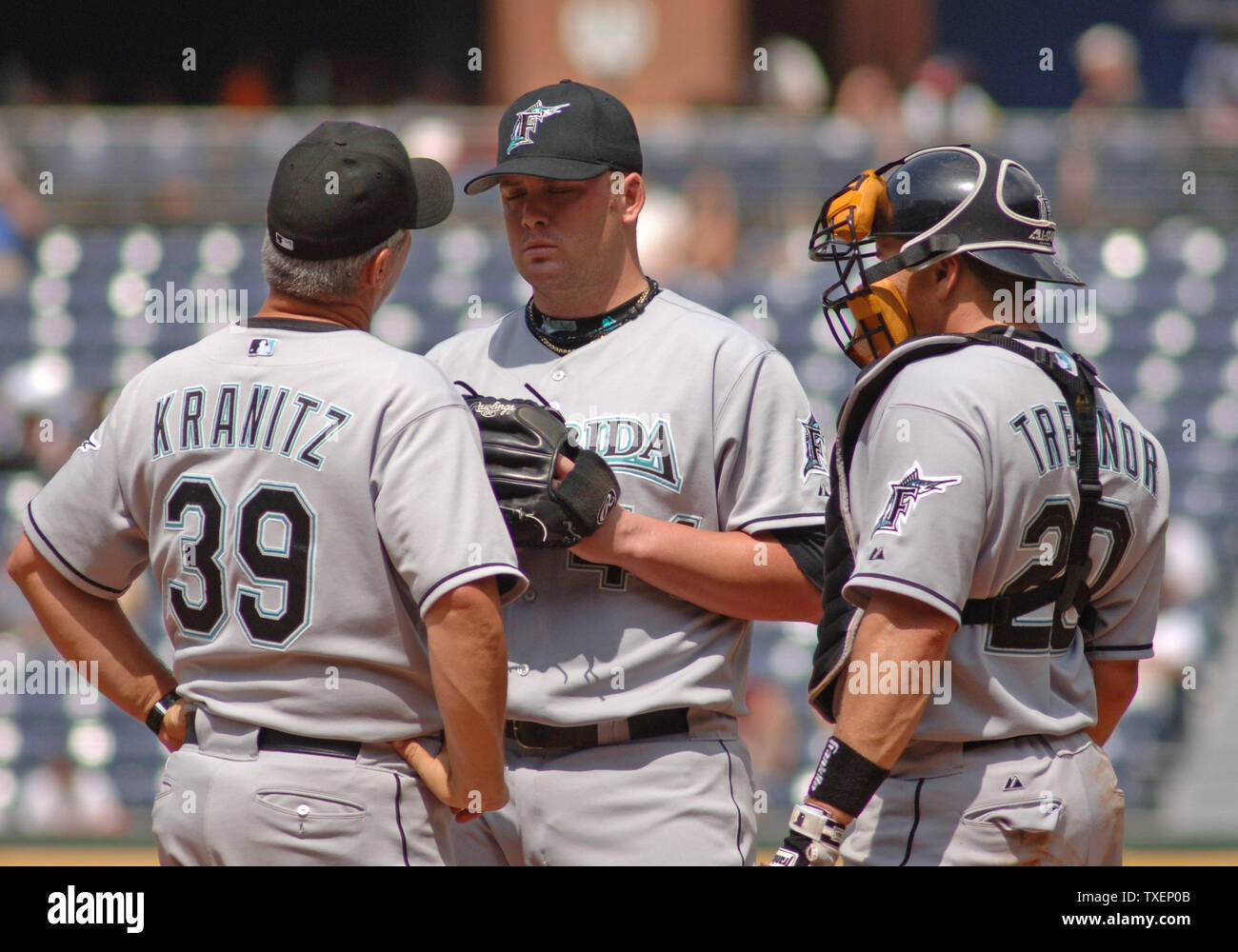 Florida Marlins relief pitcher Chris Resop talks with his pitching