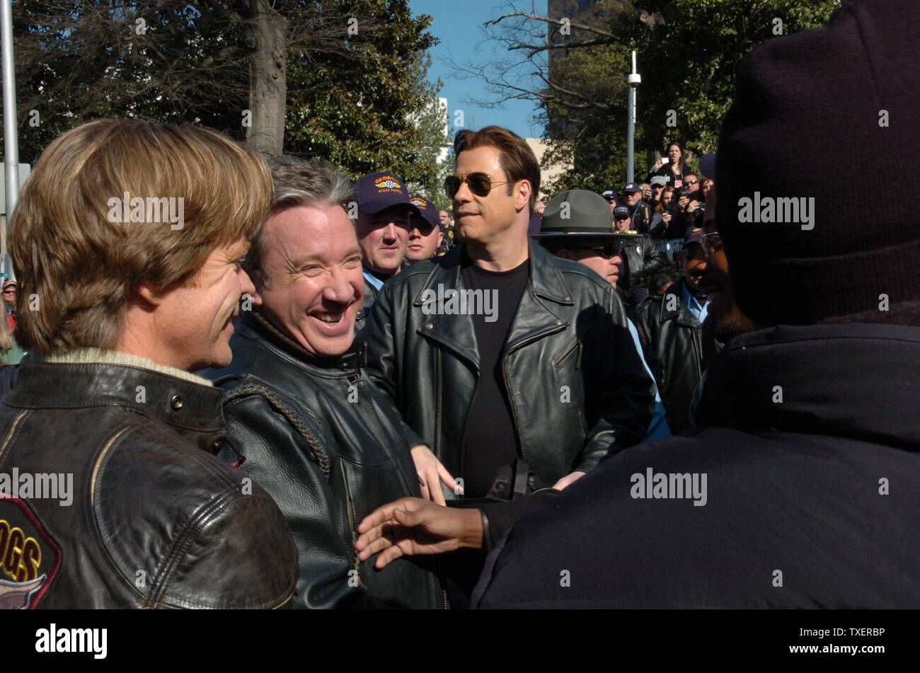 'Wild Hogs' stars Willam H. Macy (L),  Tim Allen an John Travolta appear at a motorcycle safety rally at the Georgia State Capitol on February 6, 2007. The actors promoted a motorcycle safety program and their upcoming comedy film. (UPI Photo/John Dickerson) Stock Photo